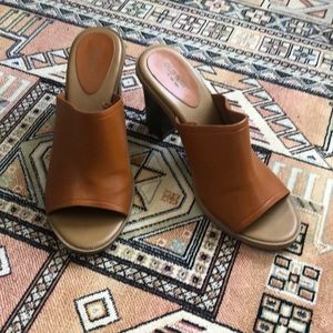 Cigna’s tan leather block heel open toe clog
